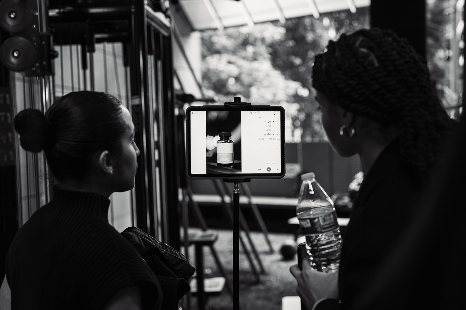 Reviewing product shot on set
